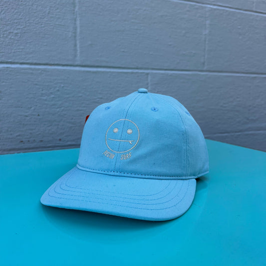SURFER SMIRK BALL CAP